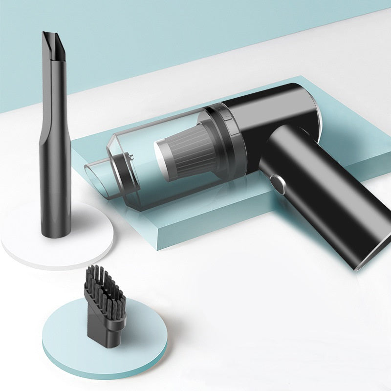 Wireless car vacuum cleaner set with black handheld unit, charging base, and brush.