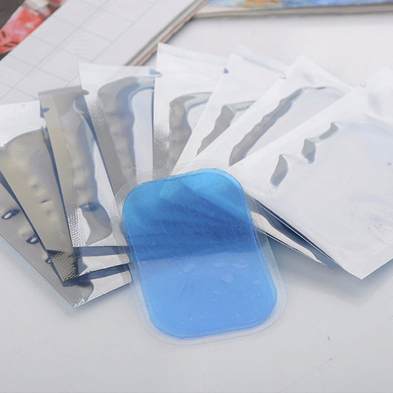 Blue EMS gel pad on backing sheets with sealed electrode packets