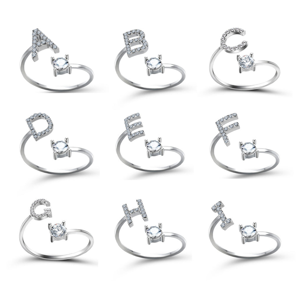 Silver tone initial letter ring set with round crystal stones, assorted letters A–I