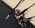 Dynamic headphones with black earbuds and gold ear cup details