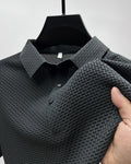 Men's textured mesh polo shirt in dark gray, short sleeves and button placket