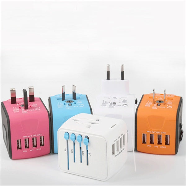 Multi-function socket adapters in pink, blue, white, and orange cubes with plugs