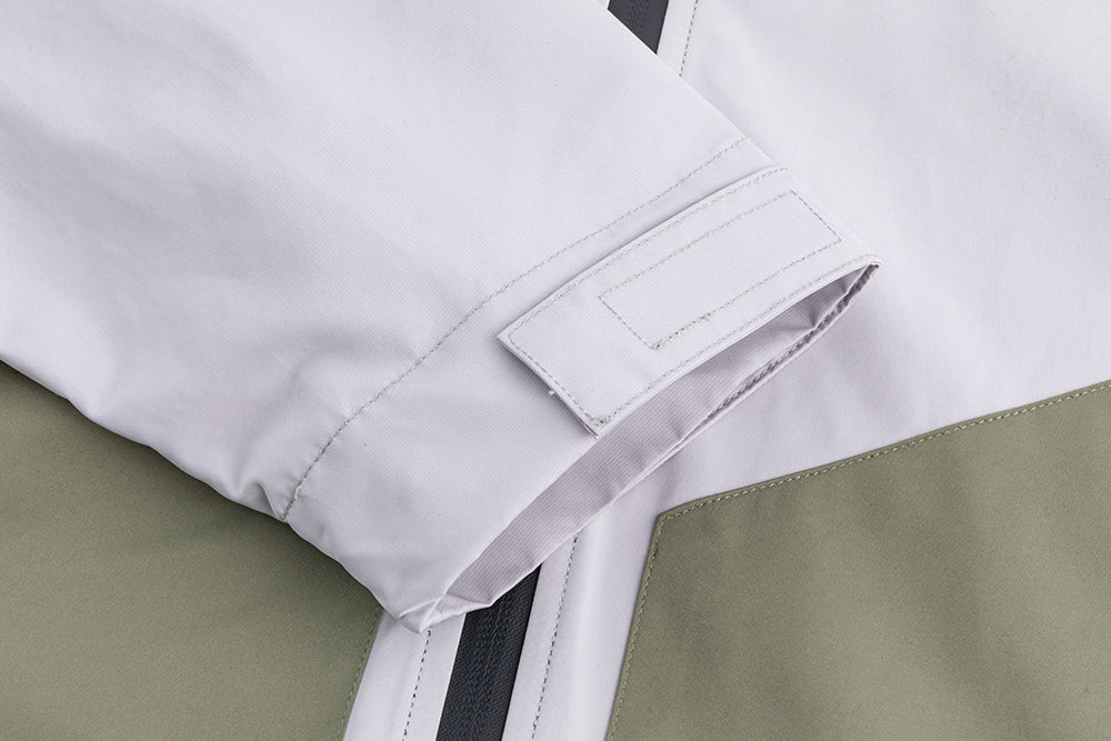 Assault suit jacket cuff and placket detail, white fabric with military green lining