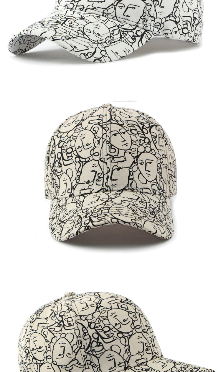 Beige retro peaked cap with black face graffiti line pattern, side and front views
