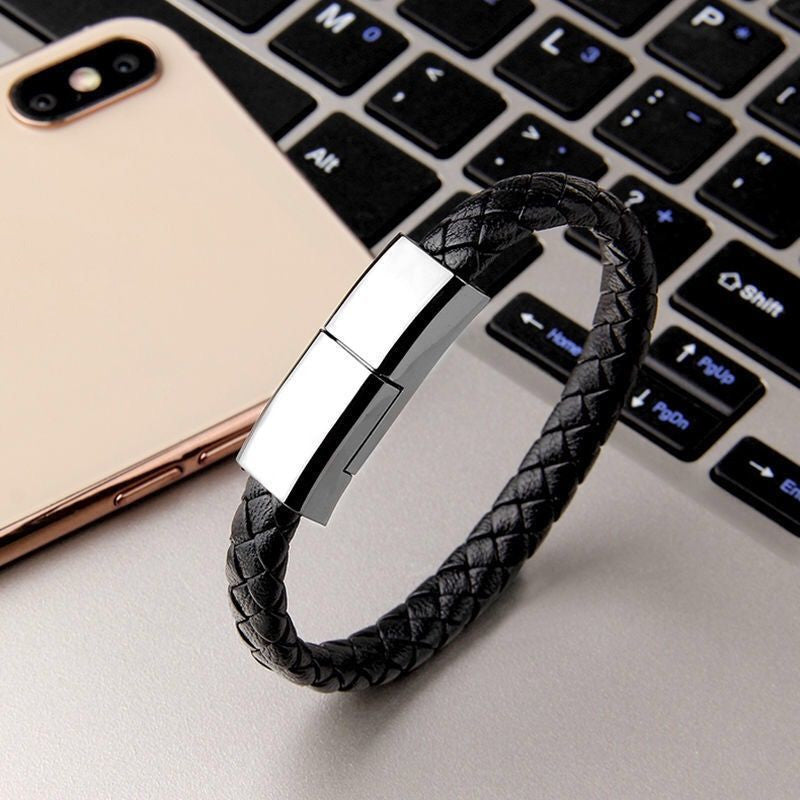 Black braided charging bracelet with silver clasp and connector housing