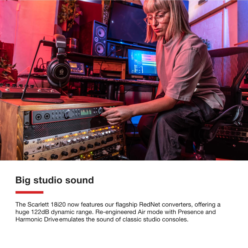Focusrite Scarlett 18i16 USB audio interface in home studio, hand on front panel controls