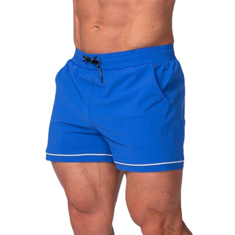 Quick-drying sport running shorts in bright blue, elastic waistband with drawstring