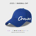 Angled view blue baseball cap with Crown logo embroidery