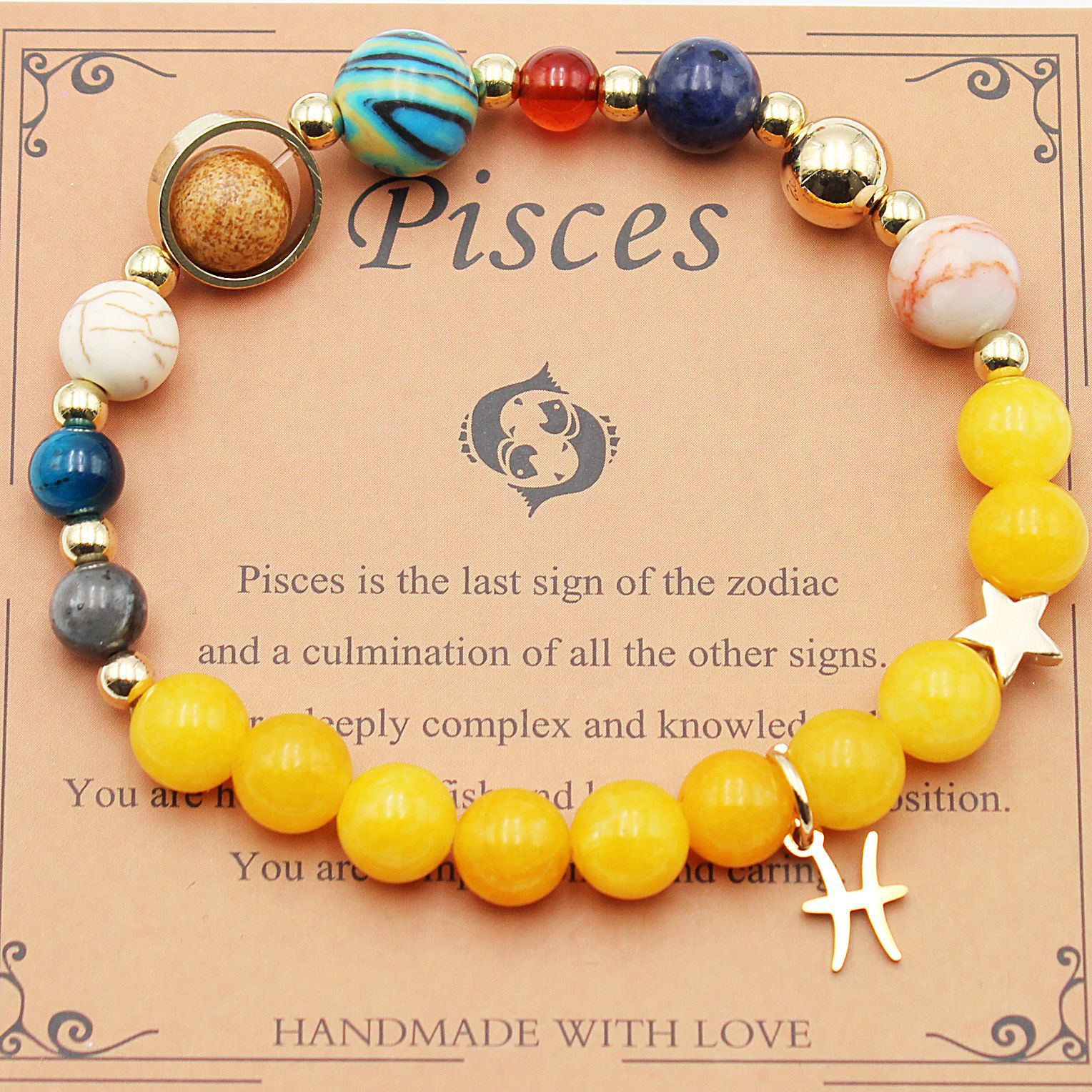 Beaded zodiac bracelet with yellow beads, gold spacers, star charm and white bead accents
