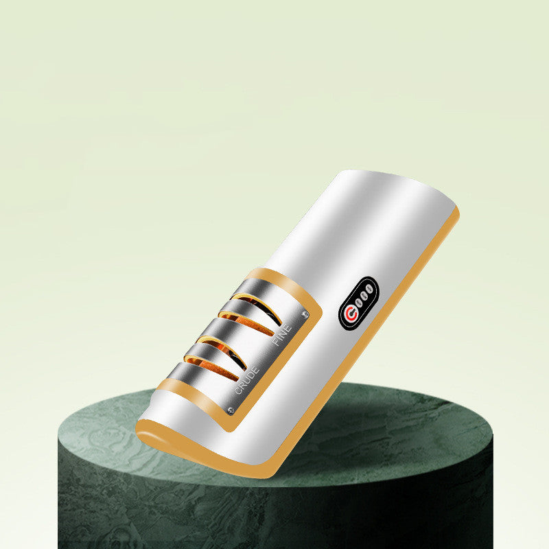 USB rechargeable electric knife sharpener with white body and orange side accents, angled on stand