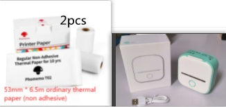 Portable mini thermal label printer with printer paper rolls and small white-and-green device