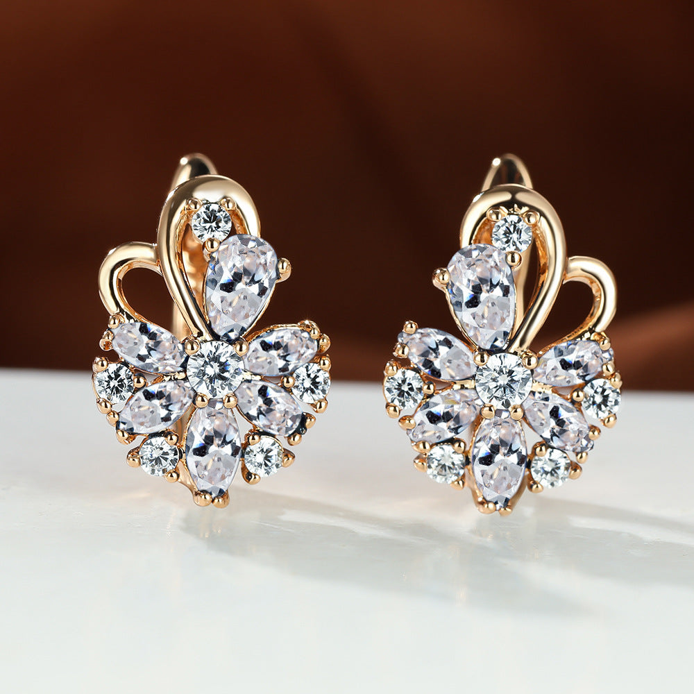 Gold flower drop zircon earrings with clear stones